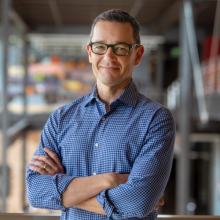 A headshot photograph of Mike Jones