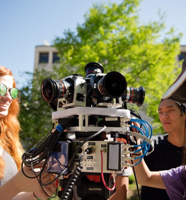 group-of-students-around-camera