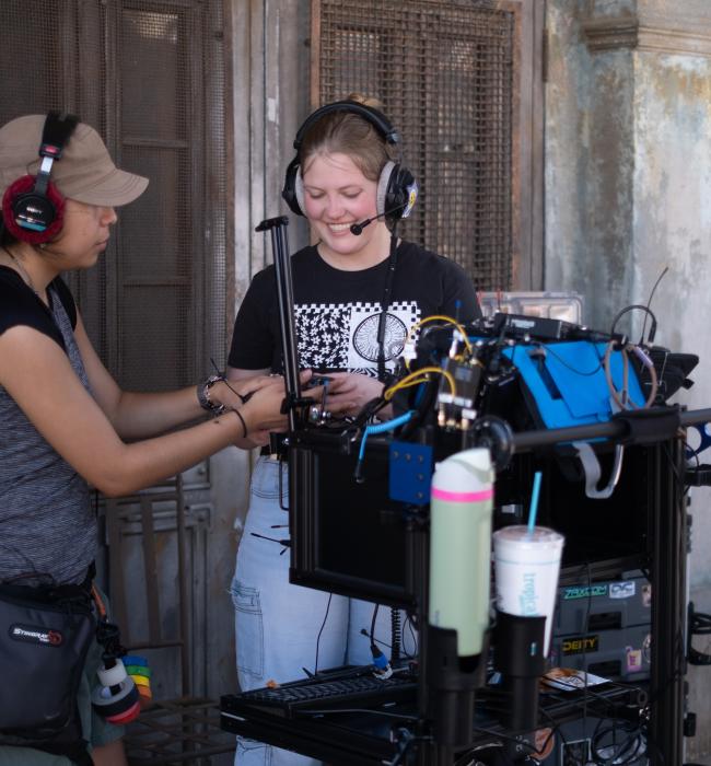 students working on set