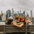 Students wearing UTNY hats looking at skyline