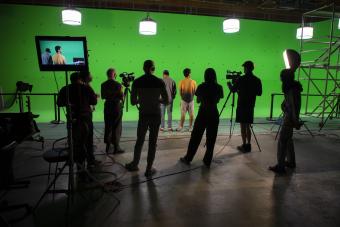 Group of students with green screen