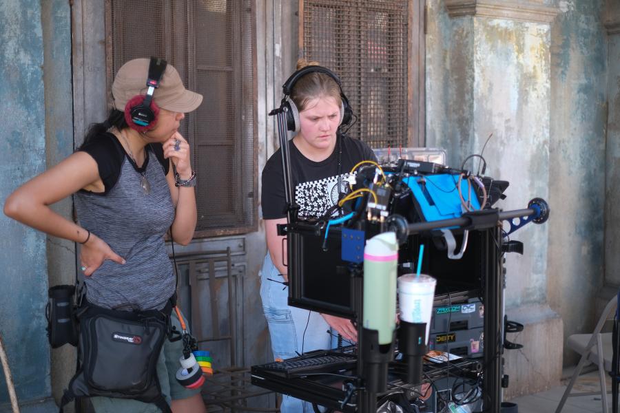 Two students working on a film set